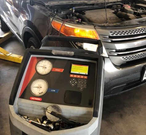 Ford car getting maintenance